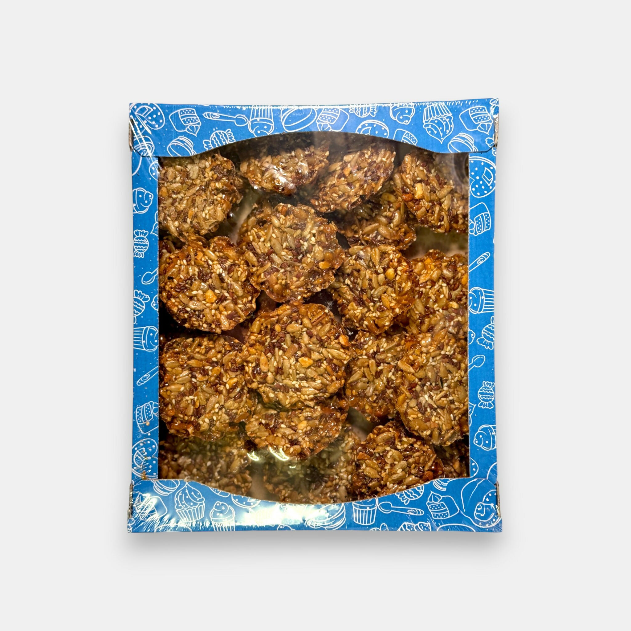 Sachet de bonbons grillés Tortoff, friandises croustillantes au caramel et aux noix, emballage bleu, vendu chez Pomo.bio à Paris.