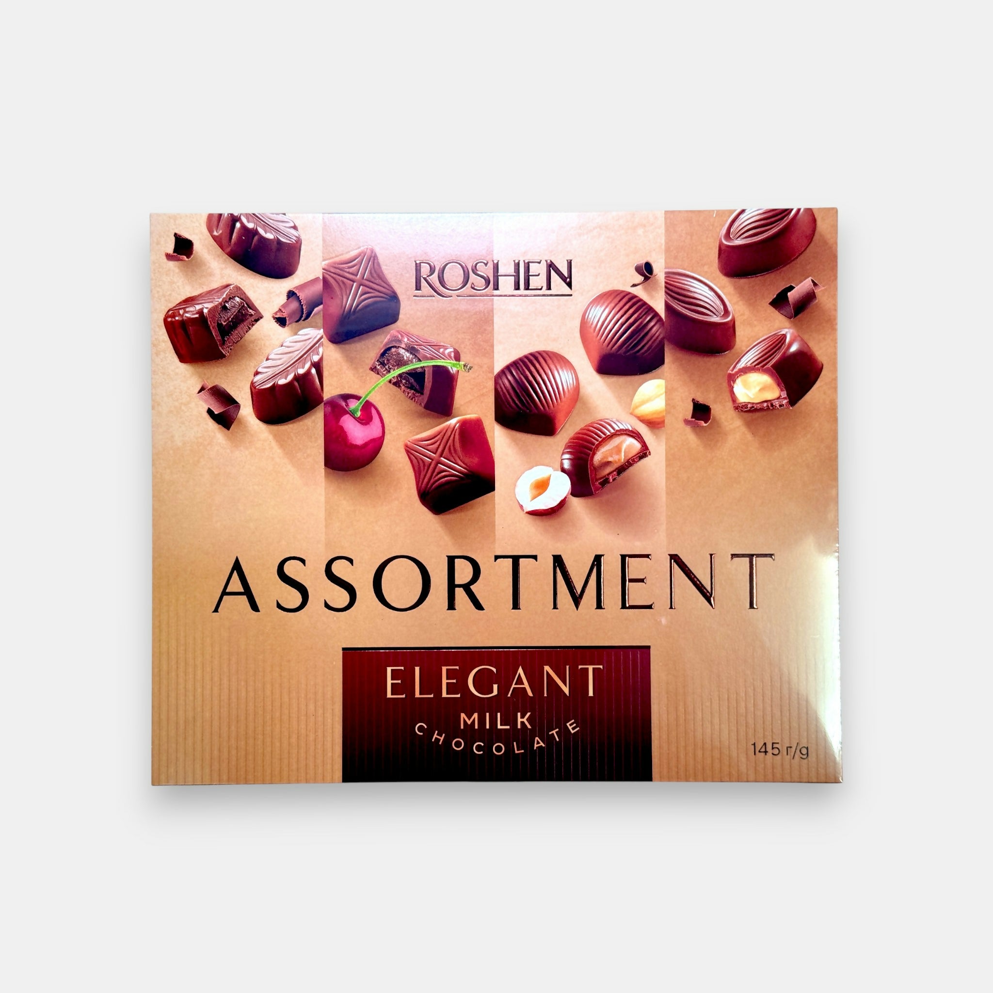 Coffret de chocolats au lait « Roshen », 145 g — assortiment élégant de chocolats fondants, spécialité slave disponible chez Pomo.bio, magasin slave à Paris.
