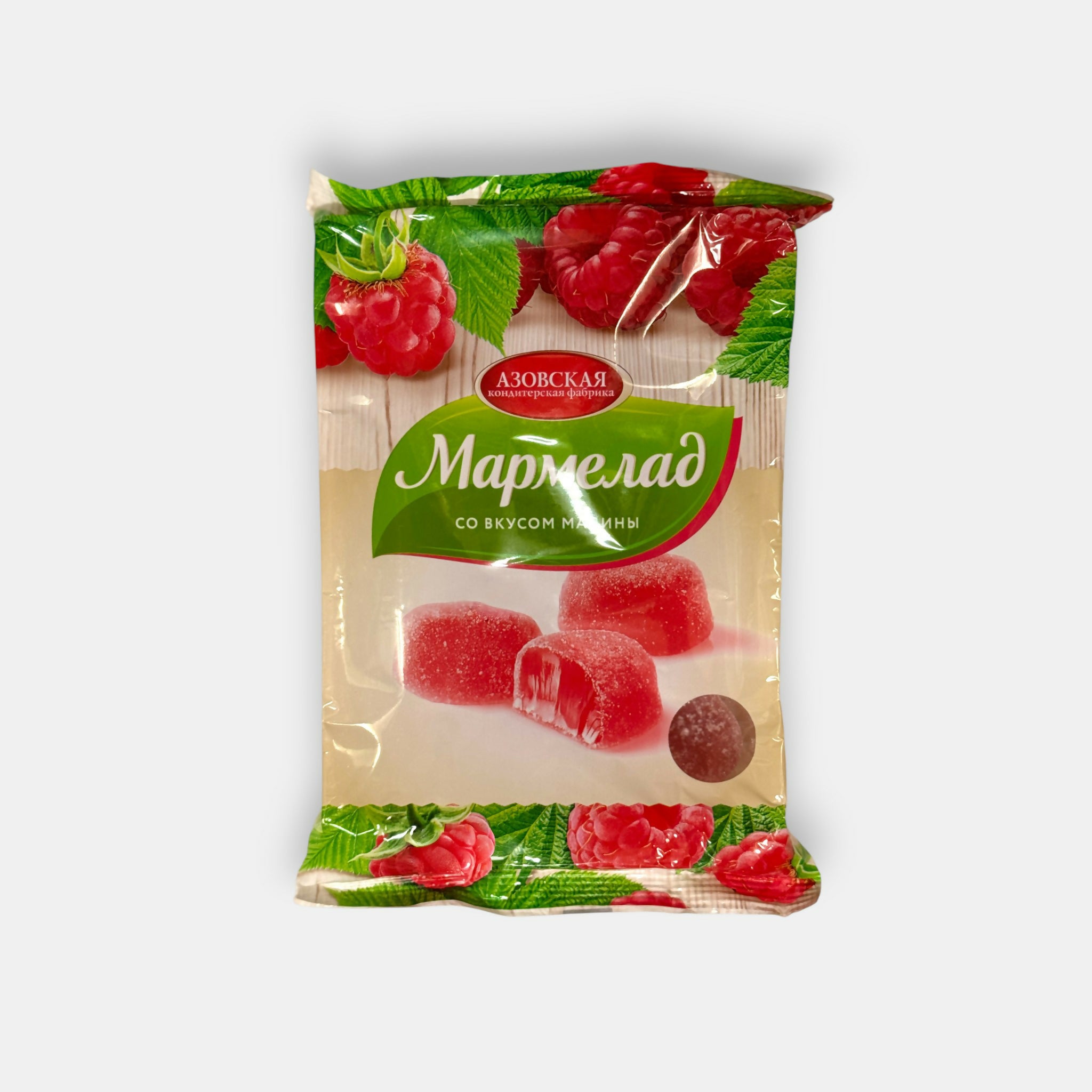 Vue de face d’un sachet de marmelade tendre goût framboise, 300 g, morceaux enrobés de sucre, spécialité d’épicerie slave Pomo.bio avec livraison rapide à Paris.