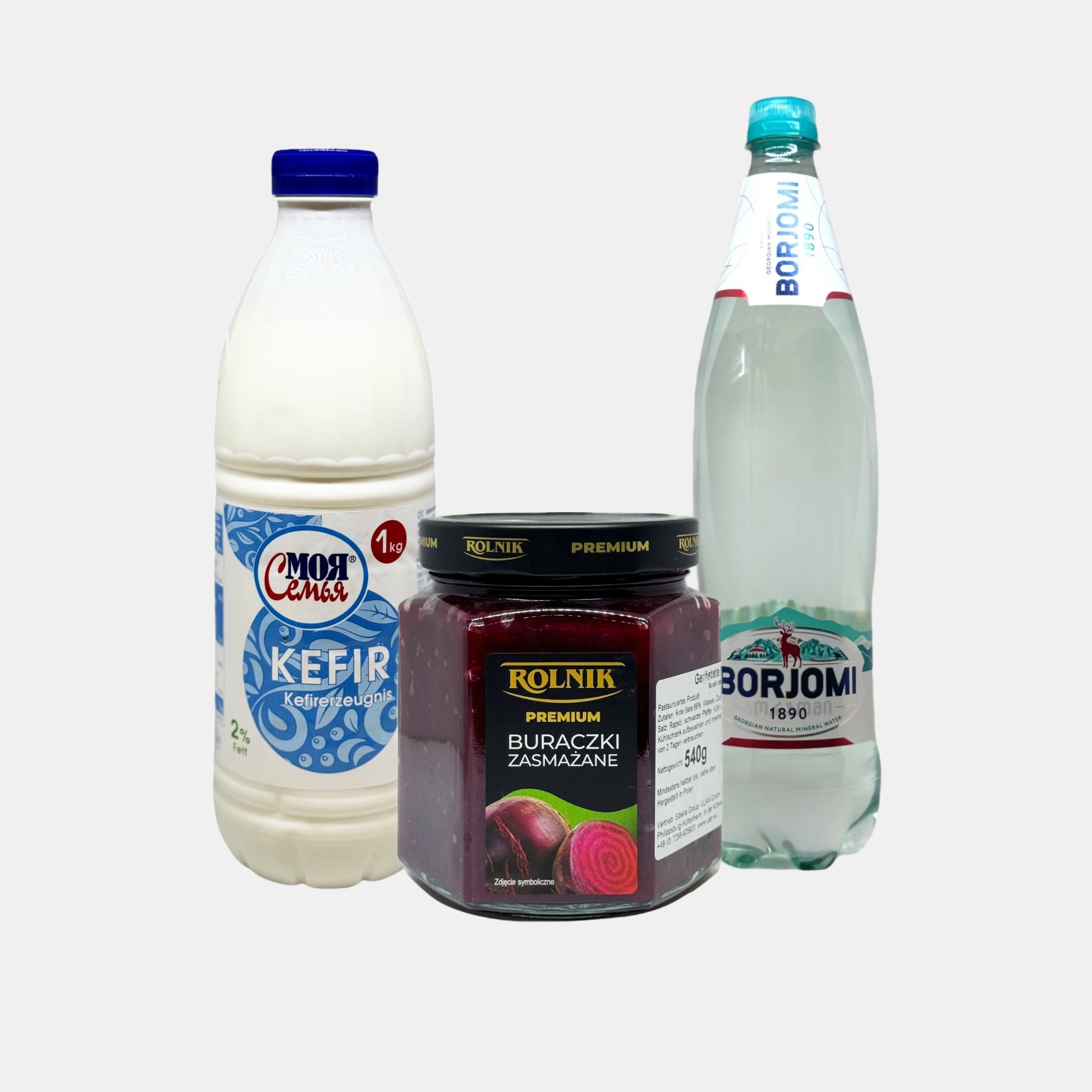 Produits slaves traditionnels pour soupe froide : kéfir, betteraves râpées et eau minérale Borjomi. Disponibles sur Pomo.bio – livraison rapide à Paris.