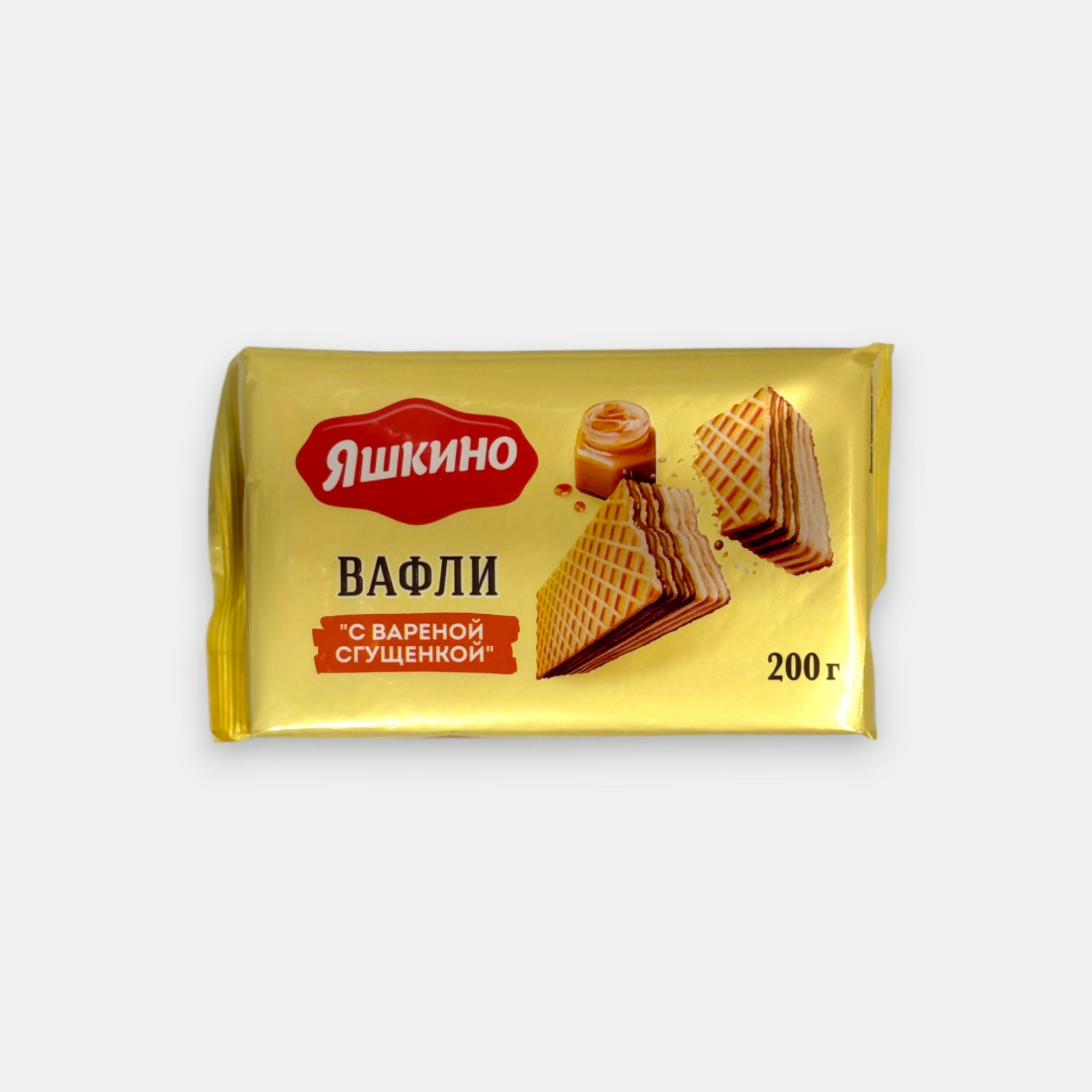 Paquet de gaufrettes au lait concentré cuit «Yashkino» 200 g, emballage jaune. Épicerie slave à Paris Pomo.bio, livraison rapide.