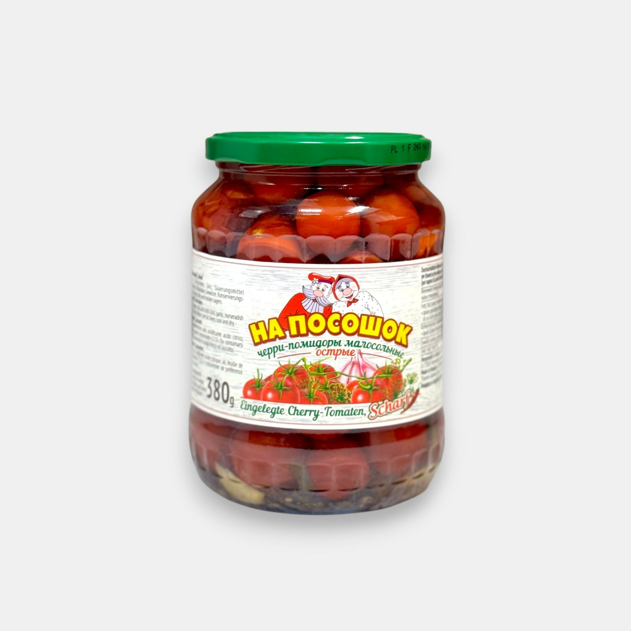 Bocal de tomates cerises légèrement salées et piquantes Na Pososhok 680 g, tomates juteuses en saumure légère, spécialité de légumes marinés disponible sur Pomo.bio avec livraison rapide à Paris