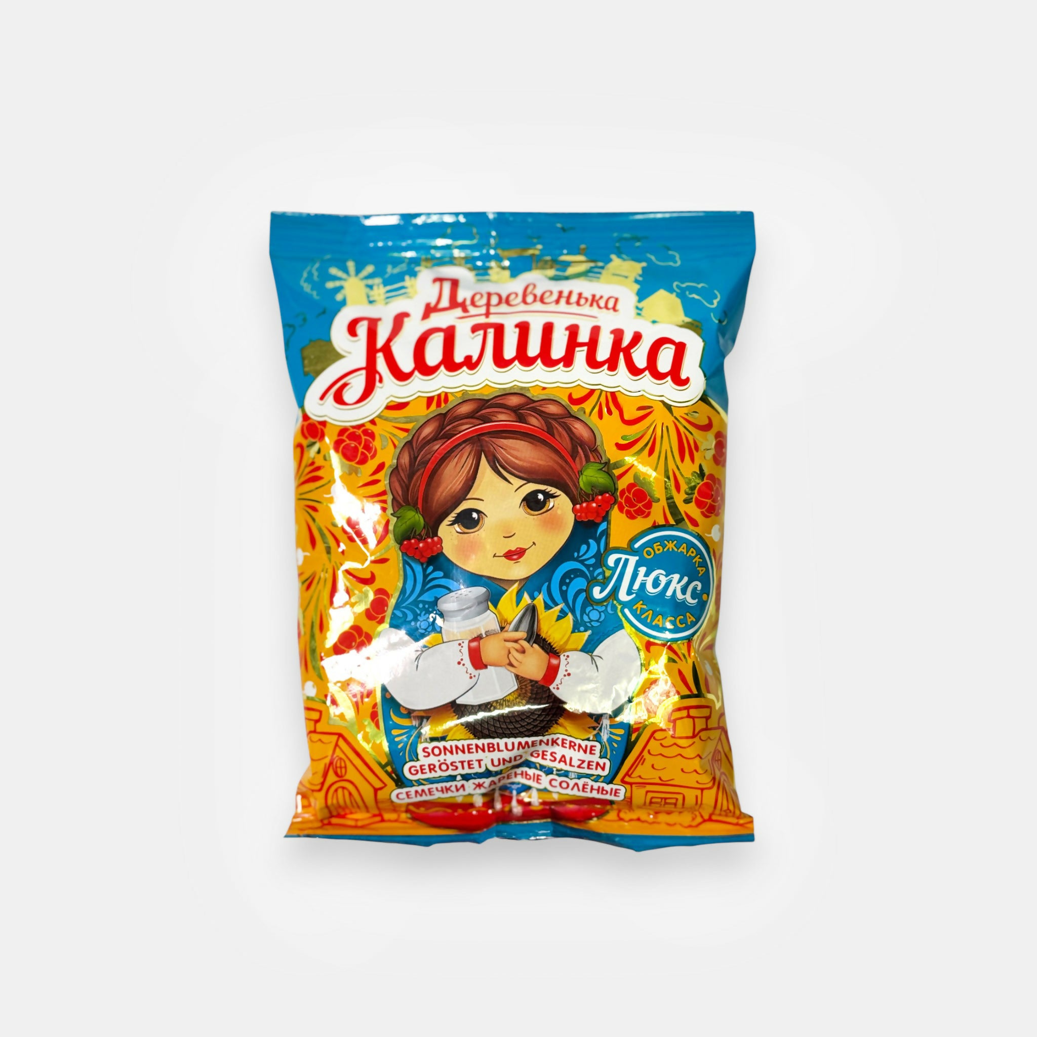 Paquet de graines de tournesol salées «Derevenka Kalinka», 250 g — graines grillées légèrement salées pour un snack simple et savoureux. Disponible sur Pomo.bio.