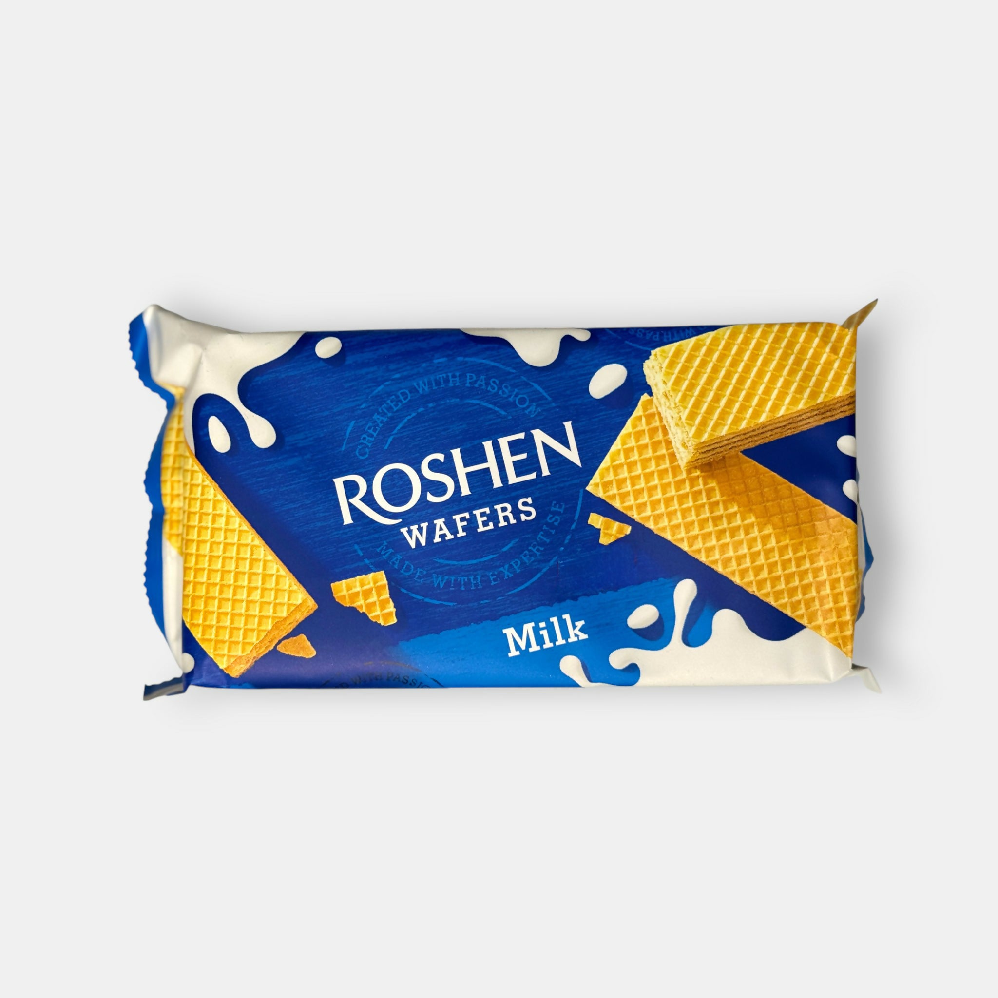 Vue de face d’un paquet de gaufrettes croustillantes Roshen, 216 g, fourrées d’une crème légère, épicerie slave Pomo.bio avec livraison rapide à Paris.