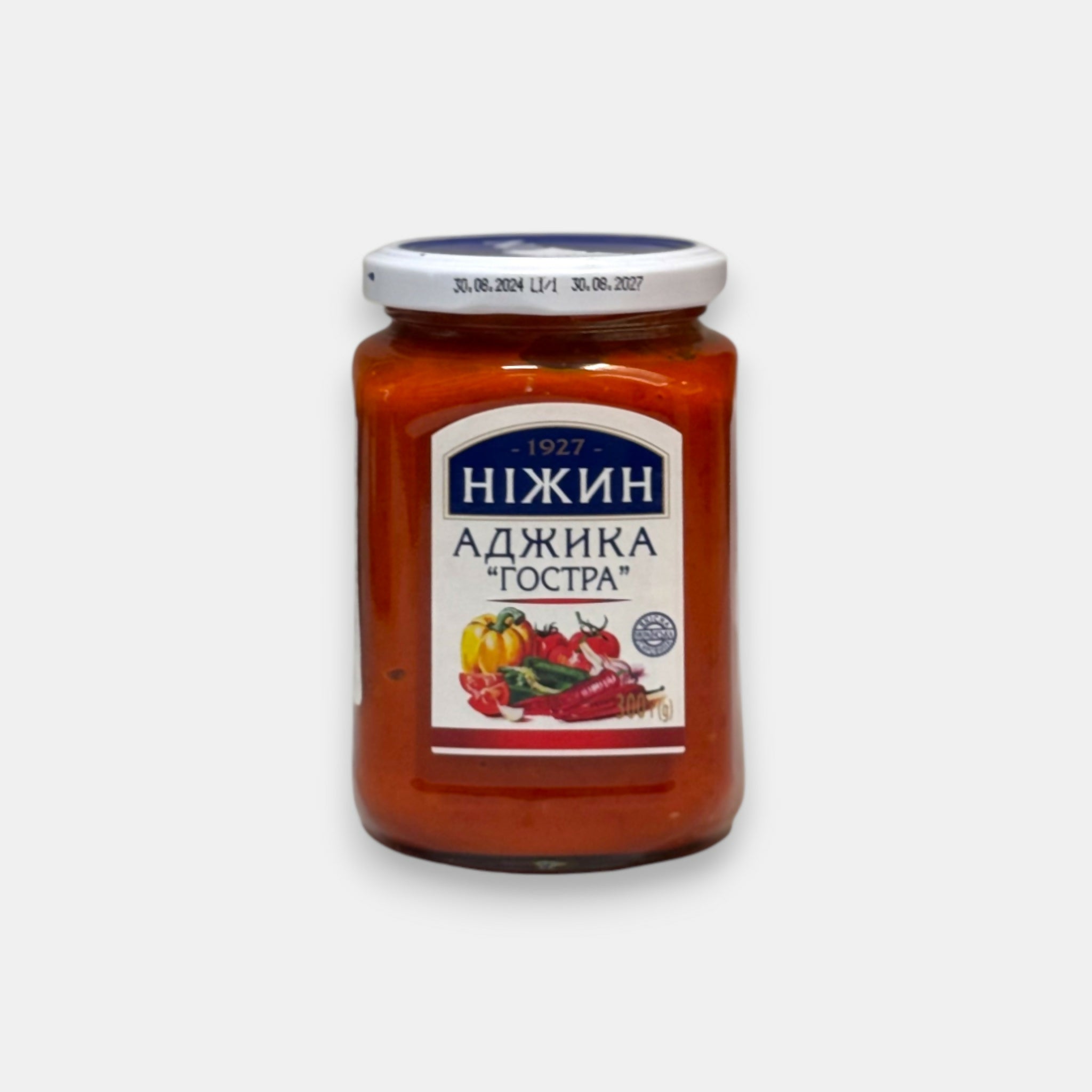 Bocal Nezhin 300 g, adjika piquante à base de tomates, poivrons et ail – sauce traditionnelle épicée, épicerie slave à Paris Pomo.bio, livraison rapide