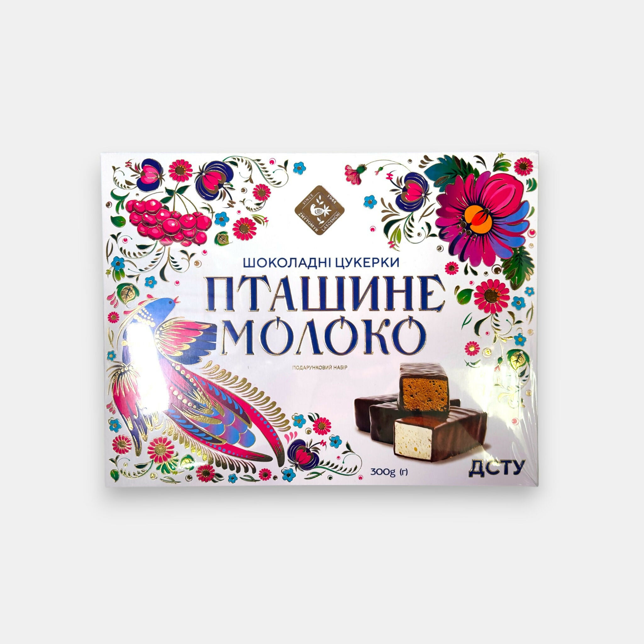 « Ptichie Moloko » de Zhytomyrski Lasoschi, 300 g — tendres confiseries au soufflé enrobées de chocolat, spécialité slave disponible chez Pomo.bio, magasin slave à Paris.