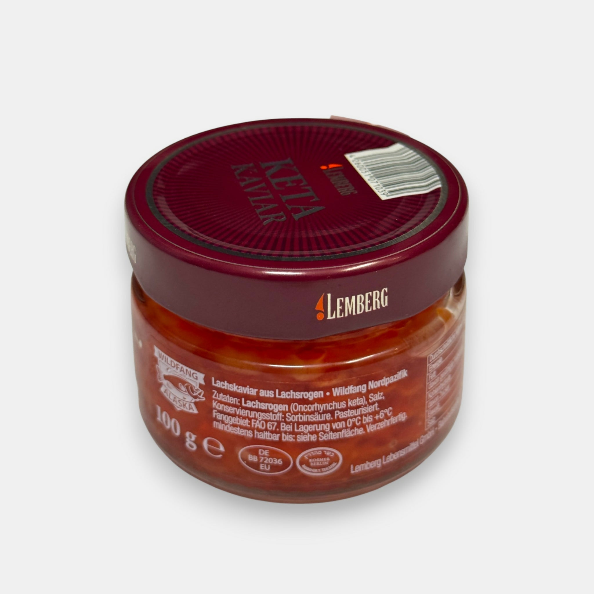 Vue arrière du pot de « caviar rouge » de saumon, 100 g, montrant l’étiquette et les informations produit, épicerie slave Pomo.bio avec livraison rapide à Paris.