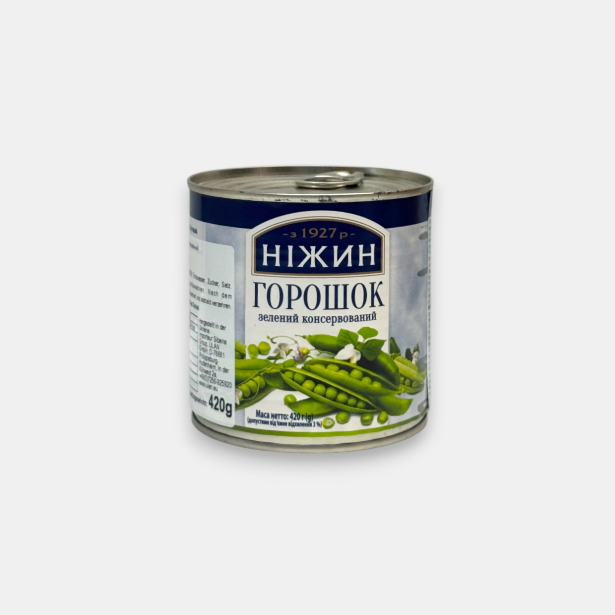 Vue de face d’une boîte de pois verts en conserve 420 g de la marque Nizhyn, spécialité ukrainienne. Disponible sur Pomo.bio – épicerie slave à Paris.